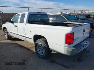 2005 Dodge Dakota SLT with VIN 1D7HE42KX5S251037, listed as a IAAI auction lot 41334761 with 202,865 mi miles and . Bid and sale history available at carsss.com. Image 3.