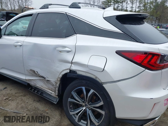 2018 Lexus RX 350 with VIN 2T2BZMCA7JC144576, listed as a IAAI auction lot 41811166 with 127,548 mi miles and . Bid and sale history available at DreamBid. Image 6.
