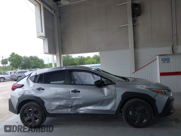 2024 Subaru Crosstrek with VIN JF2GUABC9R8307022, listed as a IAAI auction lot 42373028 with 27,040 mi miles and . Bid and sale history available at DreamBid. Image 13.
