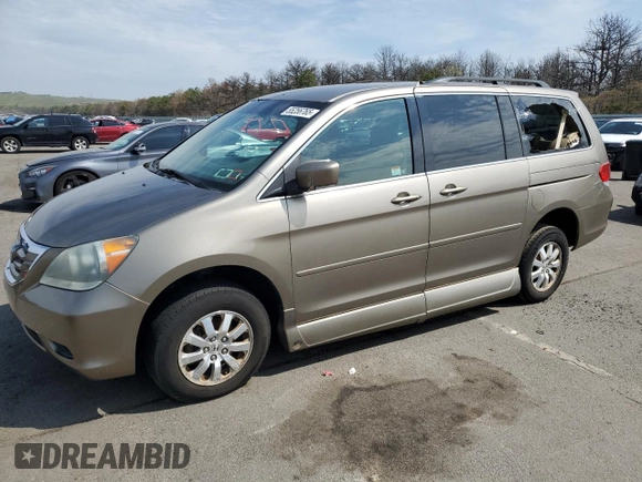 2010 Honda Odyssey EX with VIN 5FNRL3H4XAB042606, listed as a Copart auction lot 55256765 with 69,801 mi miles and Clean title. Bid and sale history available at DreamBid. Image 1.