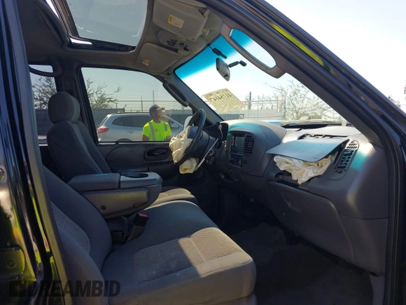 2003 Ford F-150 XLT with VIN 1FTRW07L33KA64046, listed as a IAAI auction lot 41754147 with Not Provided miles. Bid and sale history available at carsss.com. Image 5.