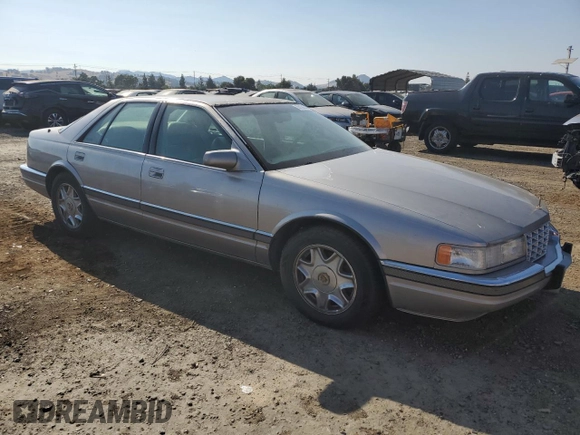 1997 Cadillac Seville Luxury SLS with VIN 1G6KS52Y0VU801906, listed as a Copart auction lot 65169364 with 191,627 mi miles and Salvage Title. Bid and sale history available at carsss.com. Image 4.