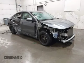 2023 Nissan Sentra S z VIN 3N1AB8BV6PY292617, wystawiony jako IAAI lot #41540395 z przebiegiem 4 131 mil mil oraz . Historia ofert i sprzedaży dostępna na DreamBid. Obrazek 1.