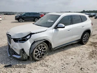 2023 BMW X1 xDrive28i with VIN WBX73EF06P5V77660, listed as a Copart auction lot 57342015 with 32,028 mi miles and Salvage title. Bid and sale history available at DreamBid. Image 1.
