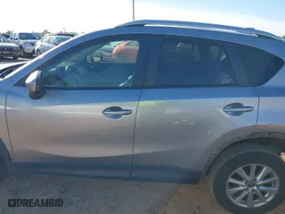 2014 Mazda CX-5 Touring with VIN JM3KE2CY2E0423376, listed as a IAAI auction lot 41650933 with 113,352 mi miles. Bid and sale history available at carsss.com. Image 14.