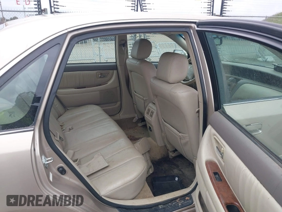 2001 Toyota Avalon XL w/Bucket Seats with VIN 4T1BF28B91U173868, listed as a IAAI auction lot 41721904 with 325,097 mi miles. Bid and sale history available at carsss.com. Image 8.