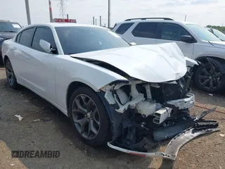 2015 Dodge Charger SXT with VIN 2C3CDXHG7FH925752, listed as a IAAI auction lot 42474528 with 216,905 mi miles and . Bid and sale history available at DreamBid. Image 1.