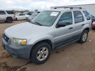 2005 Ford Escape XLT with VIN 1FMYU03175KA91500, listed as a IAAI auction lot 41958585 with 169,824 mi miles. Bid and sale history available at carsss.com. Image 2.