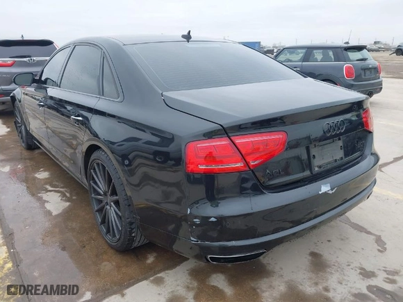 2013 Audi A8 L 4.0L with VIN WAUR2AFDXDN017895, listed as a IAAI auction lot 41609142 with 104,744 mi miles. Bid and sale history available at carsss.com. Image 3.