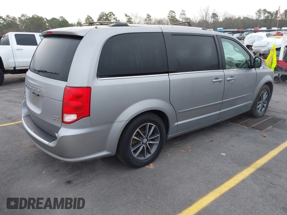 2017 Dodge Grand Caravan SXT with VIN 2C4RDGCG9HR677157, listed as a IAAI auction lot 41470342 with 66,611 mi miles and . Bid and sale history available at DreamBid. Image 4.