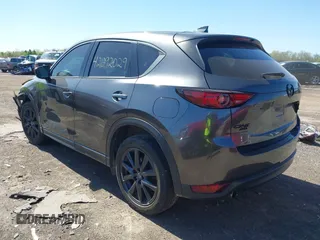 2017 Mazda CX-5 Grand Touring with VIN JM3KFBDLXH0225634, listed as a IAAI auction lot 42092029 with 86,373 mi miles and . Bid and sale history available at carsss.com. Image 3.