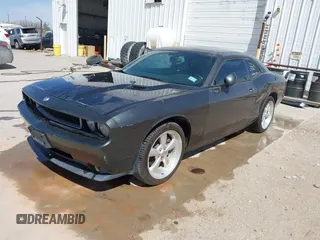 2010 Dodge Challenger R/T z VIN 2B3CJ5DTXAH270086, wystawiony jako IAAI lot #42076162 z przebiegiem 144 051 mil mil oraz . Historia ofert i sprzedaży dostępna na DreamBid. Obrazek 18.