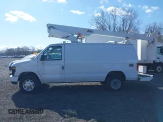 2012 Ford Econoline Cargo Super Duty Commercial with VIN 1FTSE3EL5CDB22042, listed as a IAAI auction lot 41950506 with 157,363 mi miles. Bid and sale history available at carsss.com. Image 14.