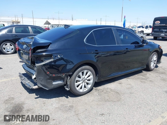 2020 Toyota Camry LE with VIN 4T1C11AKXLU955851, listed as a IAAI auction lot 41996827 with 59,008 mi miles and . Bid and sale history available at carsss.com. Image 4.