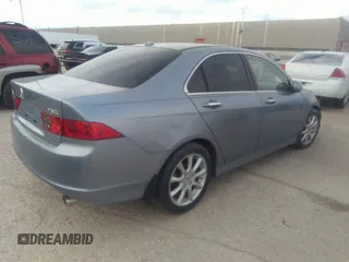 2008 Acura TSX with VIN JH4CL96858C016127, listed as a IAAI auction lot 40953648 with 168,637 mi miles and . Bid and sale history available at DreamBid. Image 4.