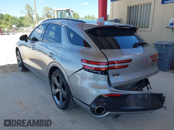 2023 Genesis GV70 Sport with VIN KMUMCDTC4PU098990, listed as a IAAI auction lot 42039386 with 32,090 mi miles and . Bid and sale history available at DreamBid. Image 3.