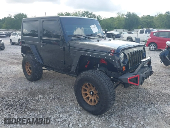 2012 Jeep Wrangler Sport z VIN 1C4AJWAG2CL286680, wystawiony jako IAAI lot #42434411 z przebiegiem 97 142 mil mil oraz . Historia ofert i sprzedaży dostępna na DreamBid. Obrazek 1.