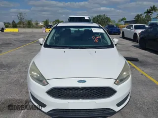 2015 Ford Focus SE with VIN 1FADP3F23FL329375, listed as a IAAI auction lot 42170945 with 114,180 mi miles. Bid and sale history available at carsss.com. Image 6.