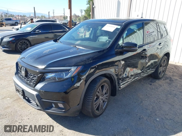 2019 Honda Passport EX-L with VIN 5FNYF7H58KB005624, listed as a IAAI auction lot 41344058 with 63,867 mi miles and . Bid and sale history available at carsss.com. Image 2.