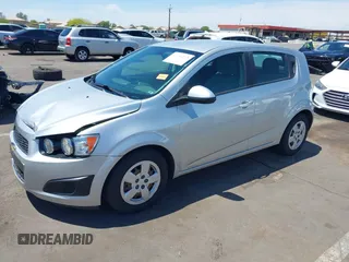 2014 Chevrolet Sonic LS with VIN 1G1JA6SH1E4135729, listed as a IAAI auction lot 42169273 with 74,969 mi miles and . Bid and sale history available at DreamBid. Image 2.
