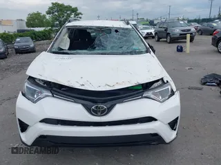 2018 Toyota RAV4 LE with VIN JTMBFREV6JJ210226, listed as a IAAI auction lot 42700312 with Not provided miles and . Bid and sale history available at DreamBid. Image 13.