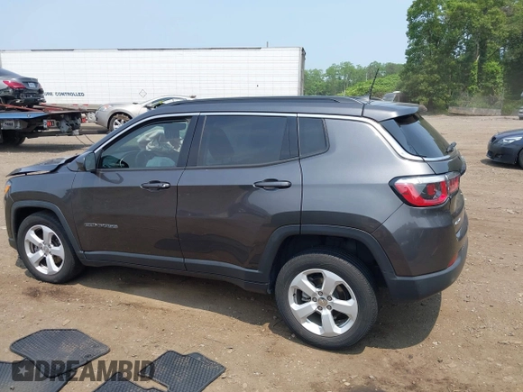 2019 Jeep Compass Altitude with VIN 3C4NJDBB1KT734970, listed as a IAAI auction lot 42483357 with 59,425 mi miles and . Bid and sale history available at DreamBid. Image 14.