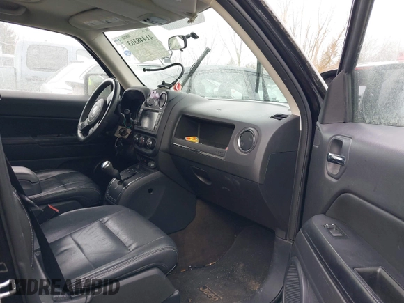 2015 Jeep Patriot High Altitude with VIN 1C4NJRFB0FD272338, listed as a IAAI auction lot 41448363 with 131,170 mi miles and . Bid and sale history available at carsss.com. Image 5.