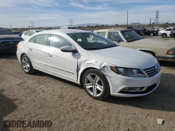 2014 Volkswagen CC R-Line with VIN WVWBP7AN0EE509782, listed as a Copart auction lot 87114074 with 66,204 mi miles and Salvage Title. Bid and sale history available at carsss.com. Image 4.