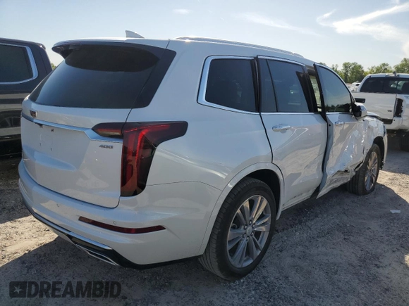 2024 Cadillac XT6 FWD Premium Luxury with VIN 1GYKPCRS1RZ700963, listed as a Copart auction lot 49031094 with 2,977 mi miles and Salvage Title. Bid and sale history available at carsss.com. Image 3.