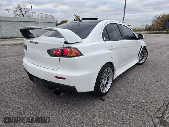 2010 Mitsubishi Lancer Evolution GSR with VIN JA32W8FV3AU021698, listed as a Copart auction lot 80026994 with 10,075 mi miles and Clean Title. Bid and sale history available at DreamBid. Image 4.