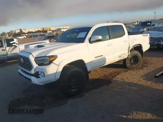 2023 Toyota Tacoma 4WD SR with VIN 3TMCZ5AN8PM647845, listed as a IAAI auction lot 41371634 with 21,917 mi miles. Bid and sale history available at carsss.com. Image 18.