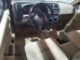2000 Nissan Frontier XE with VIN 1N6DD26S8YC337811, listed as a Copart auction lot 54775915 with 129,427 mi miles and Salvage title. Bid and sale history available at DreamBid. Image 8.