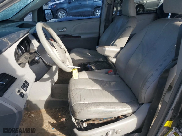 2012 Toyota Sienna XLE AAS with VIN 5TDYK3DC3CS214288, listed as a Copart auction lot 45572455 with 210,041 mi miles and Salvage Title. Bid and sale history available at carsss.com. Image 7.