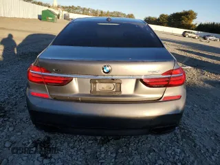 2017 BMW 7 Series with VIN WBA7F2C32HG422866, listed as a Copart auction lot 76177184 with 146,565 mi miles and Salvage Title. Bid and sale history available at DreamBid. Image 6.