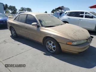 1998 Oldsmobile Intrigue GL z VIN 1G3WS52K1WF373652, wystawiony jako Copart lot #72822084 z przebiegiem 221 028 mil mil oraz Szkoda całkowita • Salvage title. Historia ofert i sprzedaży dostępna na DreamBid. Obrazek 4.