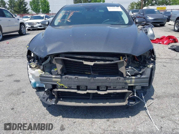 2016 Ford Fusion Titanium with VIN 3FA6P0SU1GR304590, listed as a IAAI auction lot 42381545 with 136,684 mi miles and . Bid and sale history available at DreamBid. Image 6.