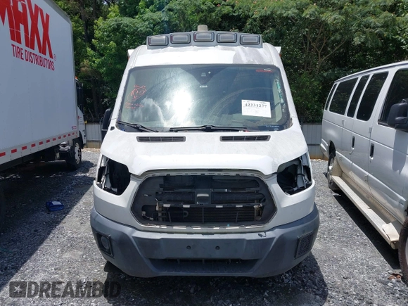 2018 Ford Transit z VIN 1FDYR2CM5JKA14321, wystawiony jako IAAI lot #42231277 z przebiegiem Nie podano mil oraz . Historia ofert i sprzedaży dostępna na DreamBid. Obrazek 12.
