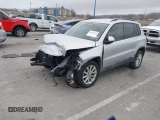 2015 Volkswagen Tiguan SE with VIN WVGAV7AX5FW592216, listed as a IAAI auction lot 41401020 with 110,726 mi miles and . Bid and sale history available at DreamBid. Image 18.