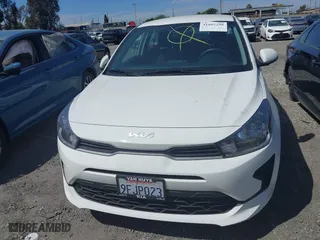 2023 Kia Rio S with VIN 3KPA24AD4PE573279, listed as a IAAI auction lot 41885298 with 11,561 mi miles. Bid and sale history available at carsss.com. Image 13.