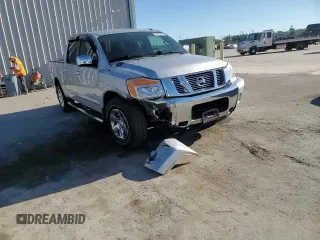 2015 Nissan Titan SV z VIN 1N6BA0ED7FN506693, wystawiony jako Copart lot #72467303 z przebiegiem 46 260 mil mil oraz Szkoda całkowita • Salvage title. Historia ofert i sprzedaży dostępna na DreamBid. Obrazek 11.
