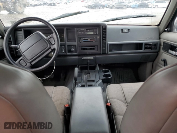 1996 Jeep Cherokee SE z VIN 1J4FJ28S9TL234675, wystawiony jako Copart lot #44796545 z przebiegiem 113 663 mil mil oraz Szkody całkowita. Historia ofert i sprzedaży dostępna na DreamBid. Obrazek 8.