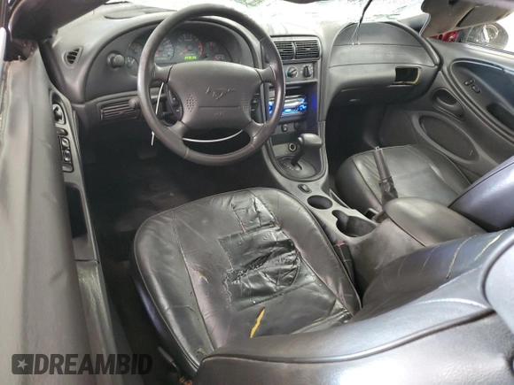 2004 Ford Mustang Deluxe with VIN 1FAFP44684F189081, listed as a Copart auction lot 59474985 with 249,812 mi miles and Salvage title. Bid and sale history available at DreamBid. Image 8.