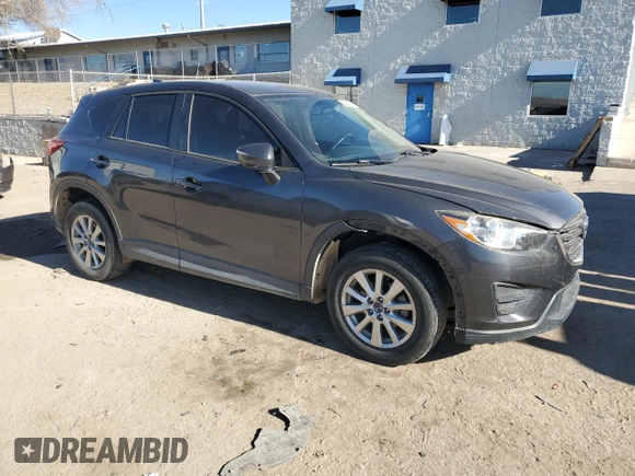 2016 Mazda CX-5 Sport with VIN JM3KE4BY3G0907976, listed as a Copart auction lot 85238414 with 92,933 mi miles and Salvage title. Bid and sale history available at DreamBid. Image 4.