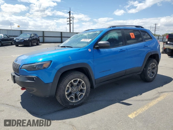 2021 Jeep Cherokee Trailhawk with VIN 1C4PJMBXXMD110436, listed as a Copart auction lot 57829375 with 46,647 mi miles and Salvage title. Bid and sale history available at DreamBid. Image 1.