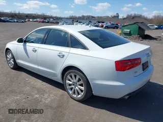2015 Audi A6 2.0T Premium Plus with VIN WAUGFAFC7FN025958, listed as a IAAI auction lot 41888489 with 100,600 mi miles. Bid and sale history available at carsss.com. Image 3.
