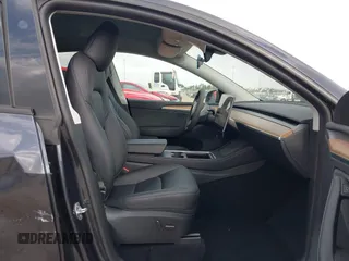 2024 Tesla Model Y Long Range with VIN 7SAYGDEE0RA261489, listed as a IAAI auction lot 41729325 with 5,060 mi miles. Bid and sale history available at carsss.com. Image 5.