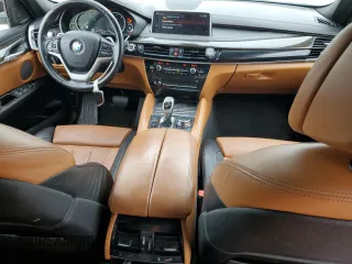 2018 BMW X6 sDrive35i with VIN 5UXKU0C5XJ0G80559, listed as a Copart auction lot 79767994 with 68,731 mi miles and Salvage Title. Bid and sale history available at carsss.com. Image 8.