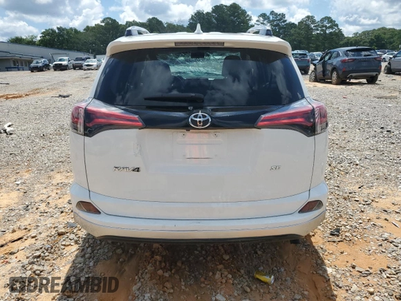 2016 Toyota RAV4 SE with VIN JTMNFREVXGD086661, listed as a Copart auction lot 58528965 with 70,523 mi miles and Salvage title. Bid and sale history available at DreamBid. Image 6.