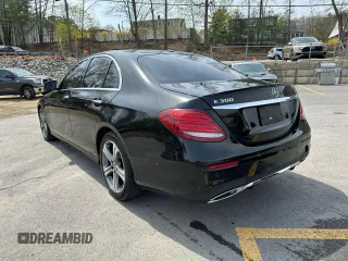 2018 Mercedes-Benz E-Class E 300 with VIN WDDZF4JB0JA452884, listed as a Copart auction lot 54899315 with 117,443 mi miles and Clean Title. Bid and sale history available at carsss.com. Image 2.