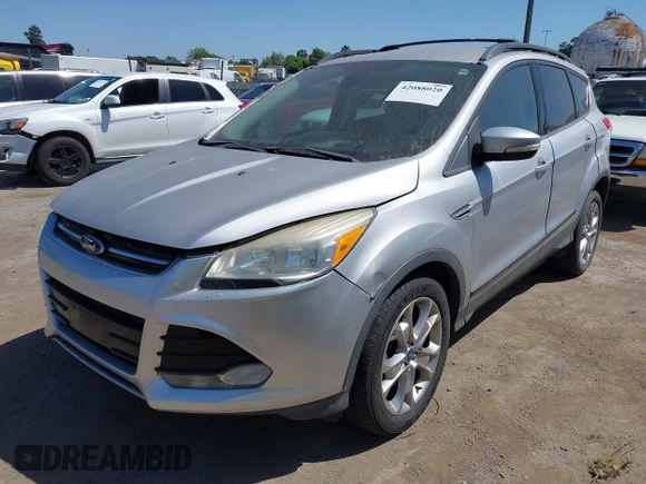 2013 Ford Escape SEL with VIN 1FMCU9HXXDUC17184, listed as a IAAI auction lot 42088020 with 63,151 mi miles. Bid and sale history available at carsss.com. Image 2.